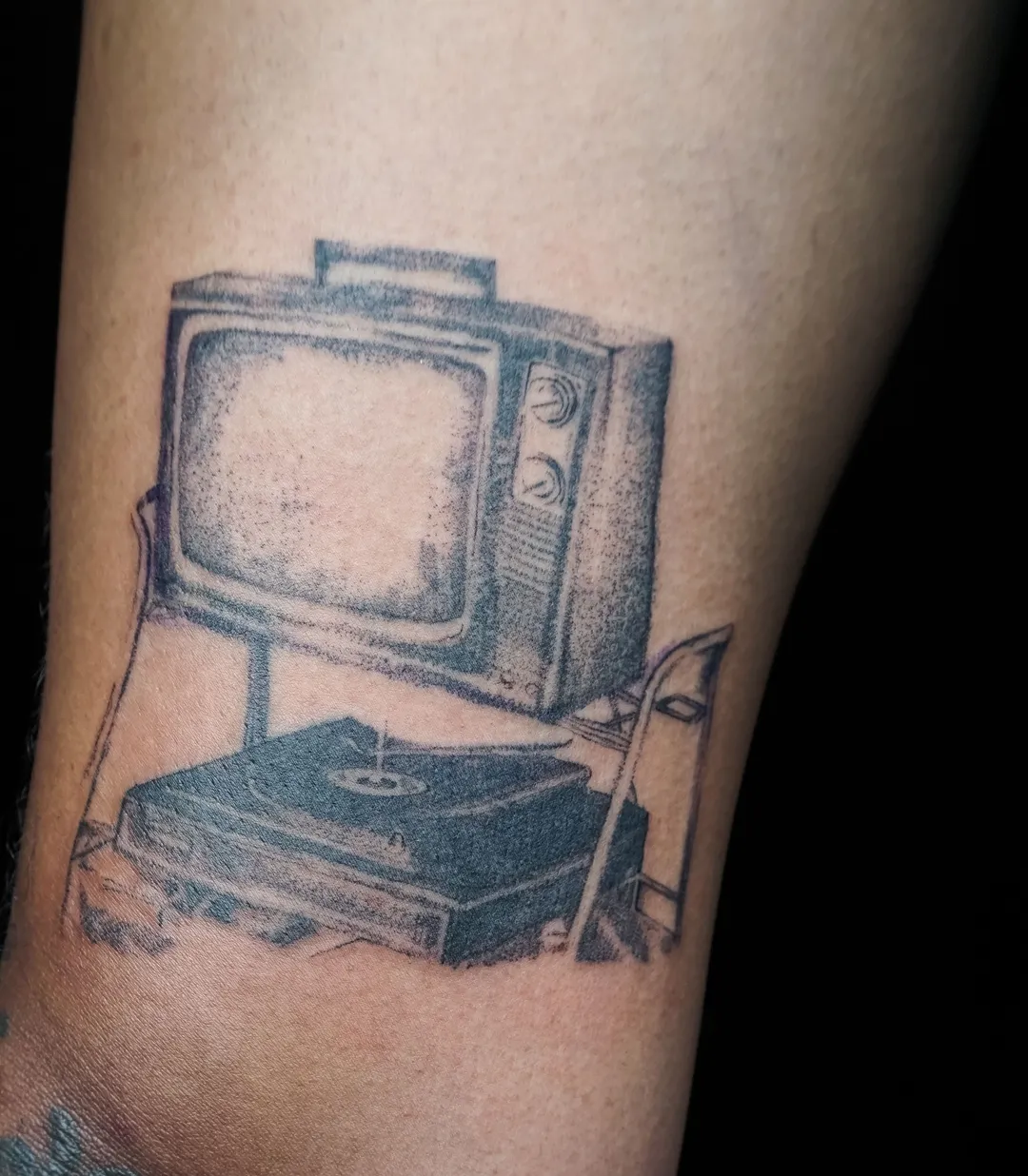 Fine-line retro television and turntable tattoo by Kin, Blacklow Studio Bali